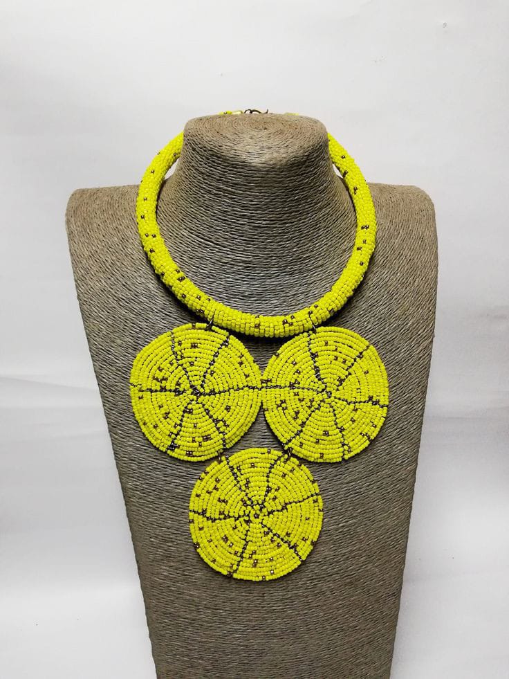 African beaded pendant necklace; yellow necklace