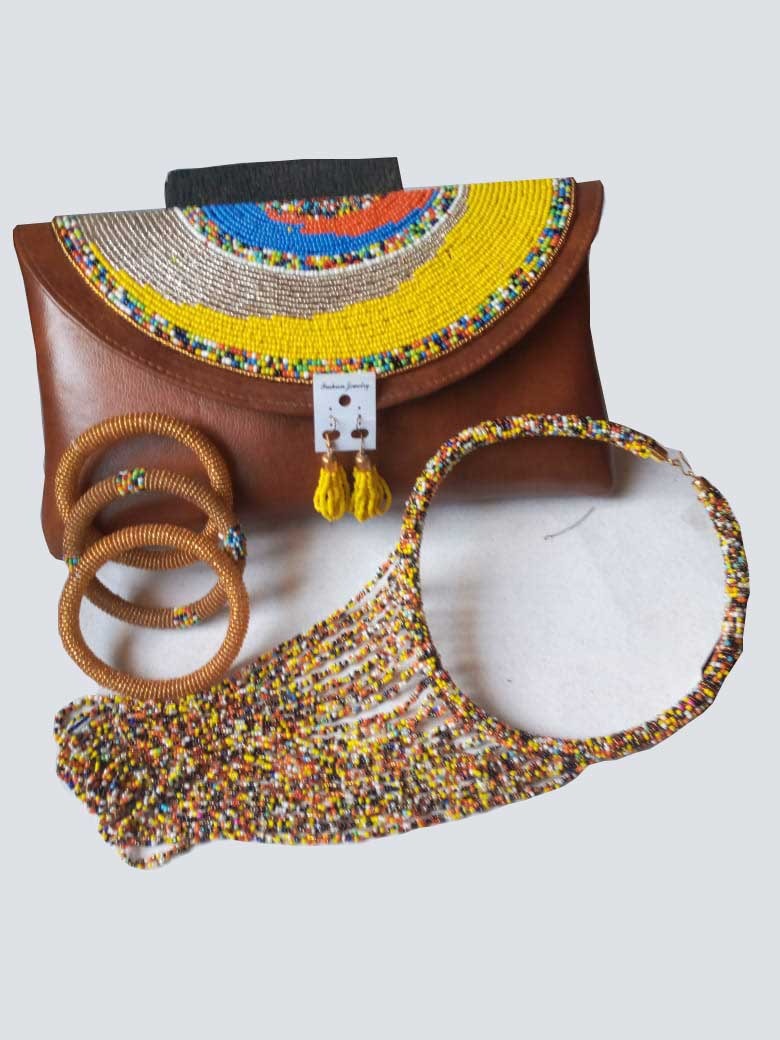 Leather clutch purse decorated with colorful beads with matching necklace, bracelets and earrings