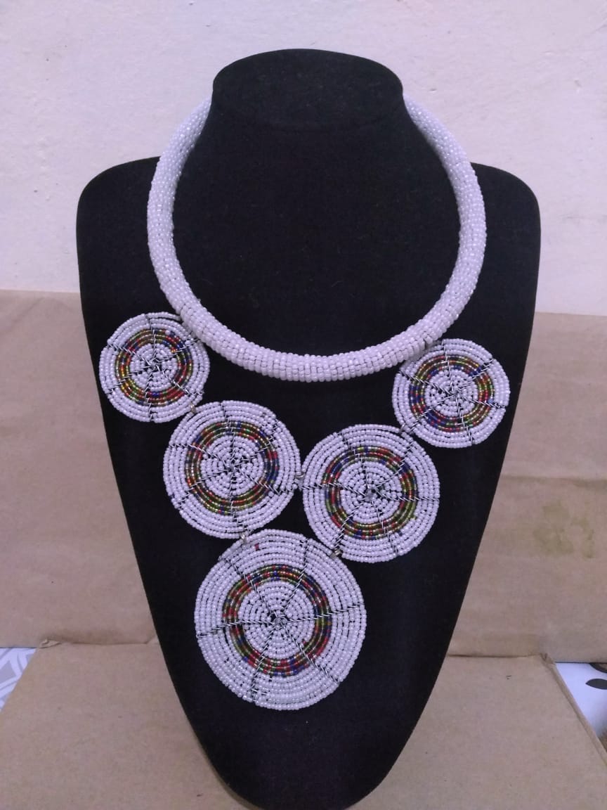 White necklace; multiple pendant necklace