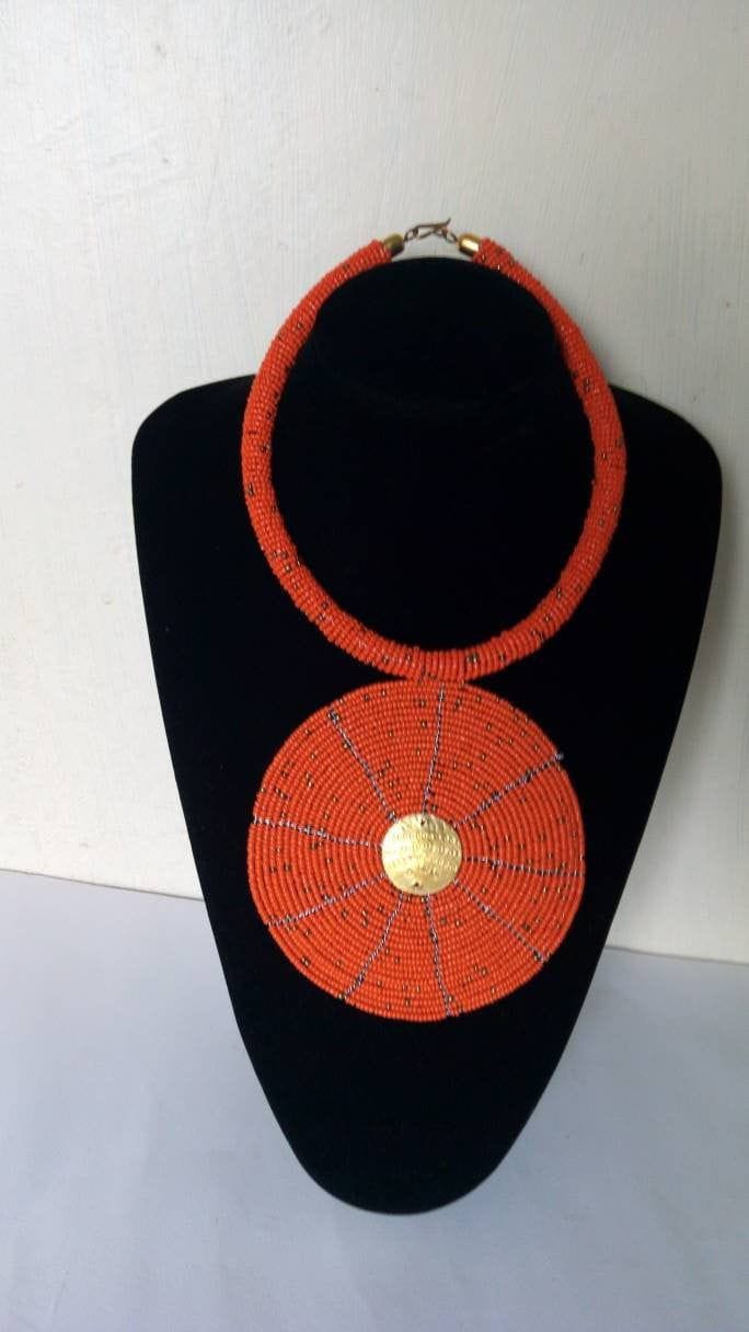 Chapati pendant necklace; Orange Zulu necklace