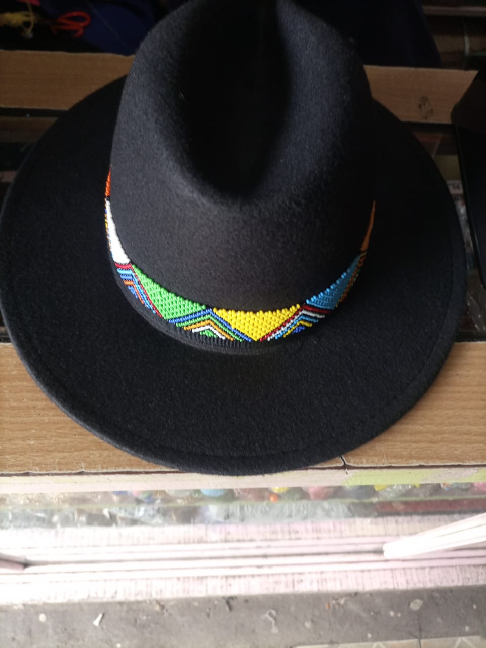 Fedora hat decorated with colorful beads