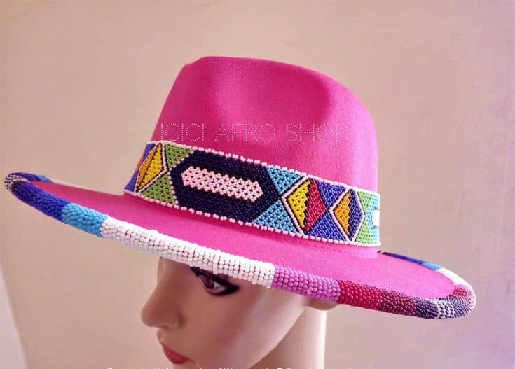 Pink Fedora hat decorated with colorful beads