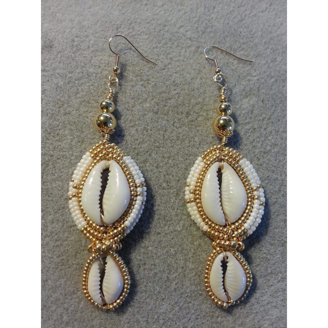 Gold Beaded earrings with cowry shell decorations