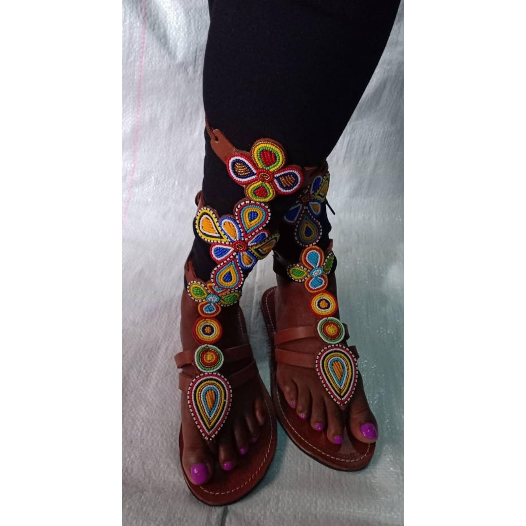 Gladiator sandals with beaded flower decorations